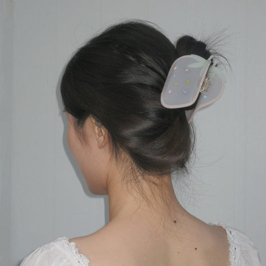 girl-in-strawberry-claw-clip-updo-hairstyle
