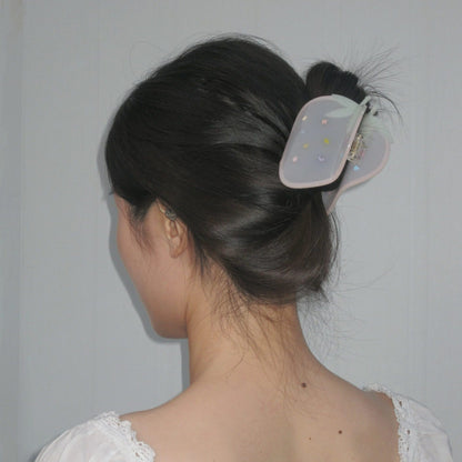 girl-in-strawberry-claw-clip-updo-hairstyle
