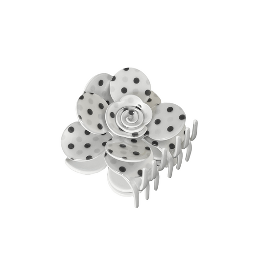 Polka dot flower hair claw clip on a white background
