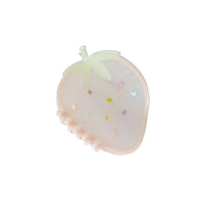 Strawberry shaped hair claw clip on a white background