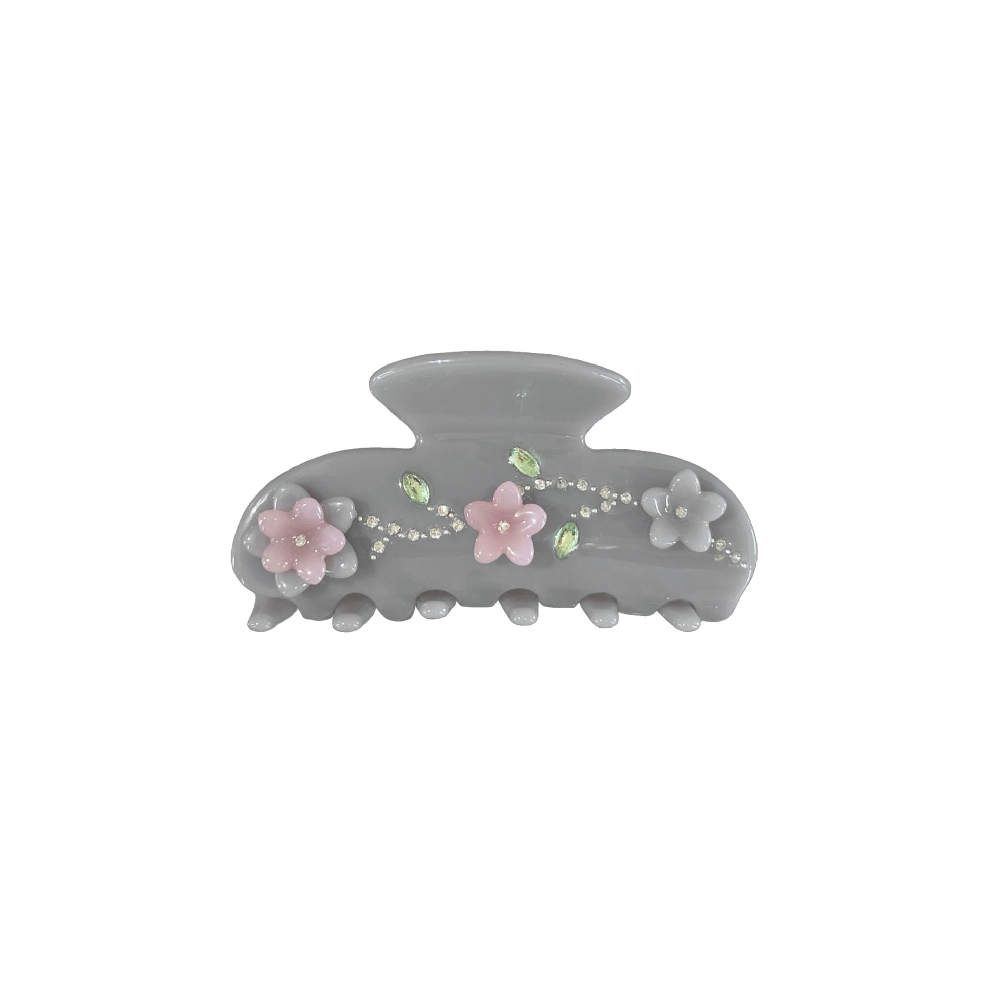 Gray hair claw clip with floral decoration and rhinestone embellish on a white background